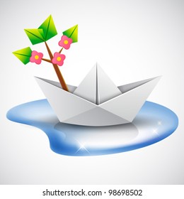 environment protection concept - save nature - paper ship with green leaves blossom tree  branch