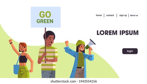 environmental activists holding poster go green save planet strike concept mix race protesters campaigning to protect earth demonstrating against global warming portrait horizontal copy space