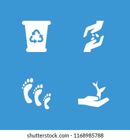 Environmental icon. collection of 4 environmental filled icons such as plant on hand, hand with seeds, family footprint. editable environmental icons for web and mobile.