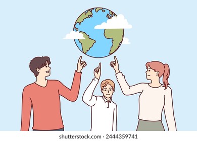Environmentally conscious people of all ages point to planet together to call for stop to pollution and climate change. Family of parents and child recommends celebrating earth day for save planet