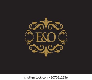 E&O Initial logo. Ornament ampersand monogram golden logo