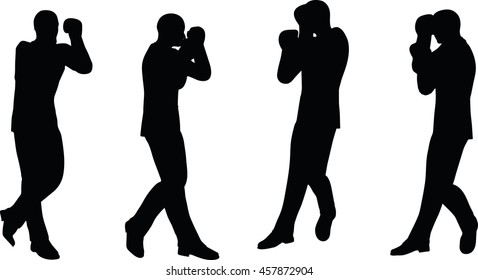 EPS 10 vector illustration of boxer businessman silhouette in black 