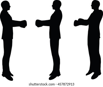 EPS 10 vector illustration of boxer businessman silhouette in black 
