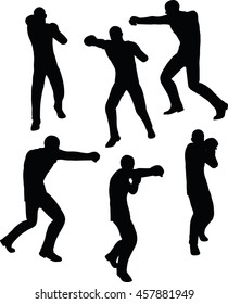 EPS 10 vector illustration of boxer businessman silhouette in black 