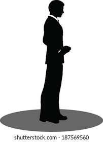 EPS 10 Vector illustration of business standing silhouette
