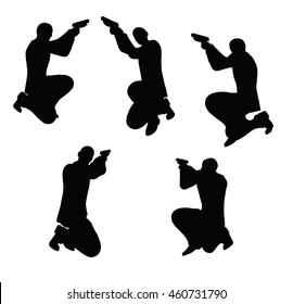 EPS 10 vector illustration of gunman businessman silhouette in black 