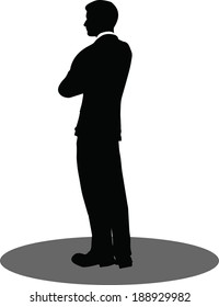 EPS 10 Vector illustration of silhouette of a business person in standing pose
