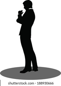 EPS 10 Vector illustration of silhouette of a business person in standing pose
