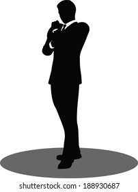 EPS 10 Vector illustration of silhouette of a business person in standing pose