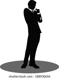 EPS 10 Vector illustration of silhouette of a business person in standing pose