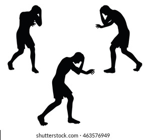 EPS 10 vector illustration of soccer player in injured pose silhouette in black
