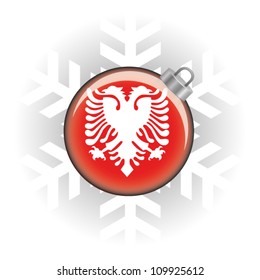 EPS10 Vector illustration of the Albanian flag in a bauble with snowflake in background