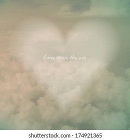 Eps10 vector illustration of cloudy sky with heart shape for web site background, brochure cover, textbox