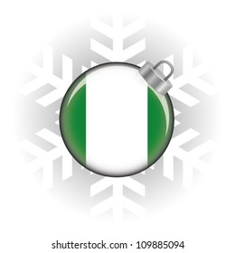 EPS10 Vector illustration of the Nigeria flag in a bauble with snowflake in background