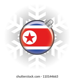 EPS10 Vector illustration of North Korea flag in a bauble with snowflake in background