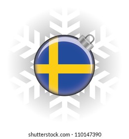 EPS10 Vector illustration of Sweden flag in a bauble with snowflake in background