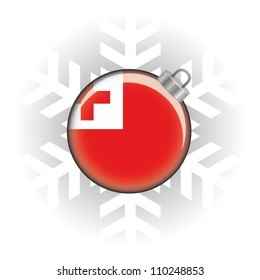 EPS10 Vector illustration of the Tonga flag in a bauble with snowflake in background