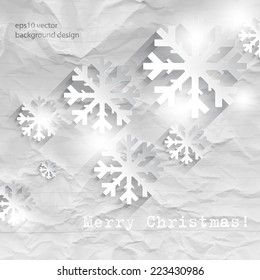 eps10 vector overlapping snowflakes on crumpled paper Christmas concept background