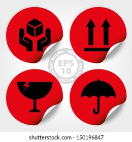 EPS10 Vector : Red Fragile Circle Stickers and Tags (Fragile icon, Handle with care icon, Keep dry icon, This side up icon)