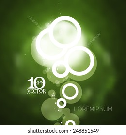 eps10 silueta vectorial anillos redondeados geométricos burbujas con focos de luz sobre fondo verde borroso 