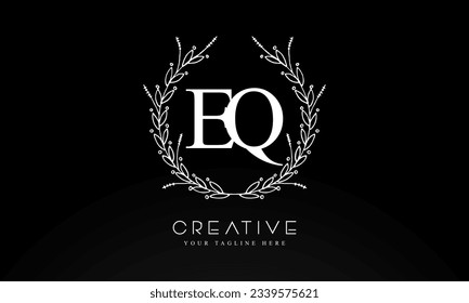 EQ initial letters logo design template  with flower circle