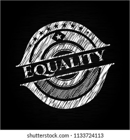 Equality written on a blackboard