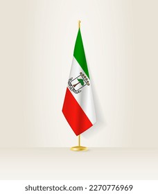 Equatorial Guinea flag on a flag stand. Vector illustration.