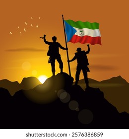 Equatorial Guinea flag, silhouette of two climbers holding flags at sunset