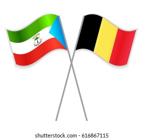Equatorial Guinean and Belgian crossed flags. Equatorial Guinea combined with Belgium isolated on white. Language learning, international business or travel concept.