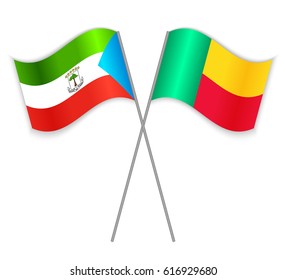 Equatorial Guinean and Beninese crossed flags. Equatorial Guinea combined with Benin isolated on white. Language learning, international business or travel concept.