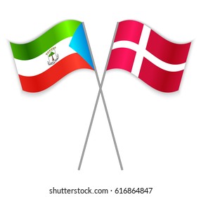 Equatorial Guinean and Danish crossed flags. Equatorial Guinea combined with Denmark isolated on white. Language learning, international business or travel concept.