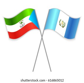 Equatorial Guinean and Guatemalan crossed flags. Equatorial Guinea combined with Guatemala isolated on white. Language learning, international business or travel concept.
