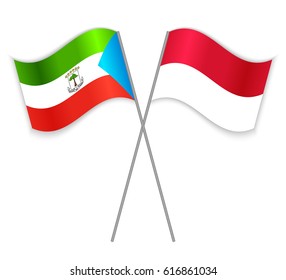 Equatorial Guinean and Indonesian crossed flags. Equatorial Guinea combined with Indonesia isolated on white. Language learning, international business or travel concept.