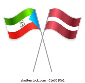 Equatorial Guinean and Latvian crossed flags. Equatorial Guinea combined with Latvia isolated on white. Language learning, international business or travel concept.