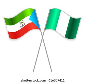 Equatorial Guinean and Nigerian crossed flags. Equatorial Guinea combined with Nigeria isolated on white. Language learning, international business or travel concept.