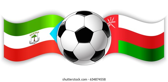 Equatorial Guinean and Omani wavy flags with football ball. Equatorial Guinea combined with Oman isolated on white. Football match or international sport competition concept.
