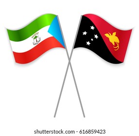 Equatorial Guinean and Papuan crossed flags. Equatorial Guinea combined with Papua New Guinea isolated on white. Language learning, international business or travel concept.