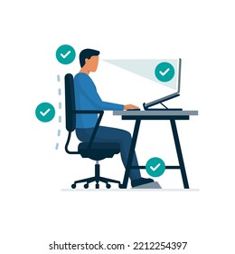 Ergonomic workspace and proper sitting posture at desk, man sitting properly at desk and working with a laptop