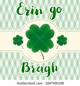 Erin go bragh. Lettering typography with realistic four leaf clover on green checkered background.