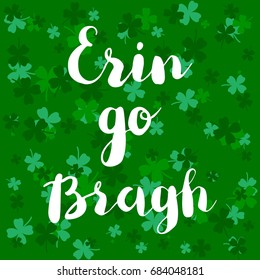 Erin go bragh. Lettering typography on green cloverleaf background.