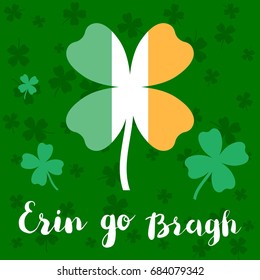 Erin go bragh. Lettering typography with big four leaf clover in colors of Ireland national flag. Green background with small clovers.