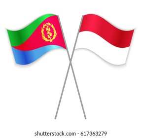 Eritrean and Indonesian crossed flags. Eritrea combined with Indonesia isolated on white. Language learning, international business or travel concept.