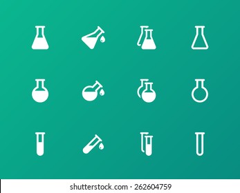 Erlenmeyer flasks flask tube icons on green background. Vector illustration.