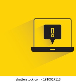 error symbol in laptop drop shadow on yellow background
