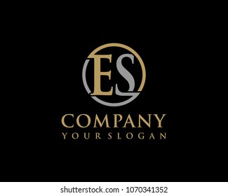 ES initial letters looping linked circle elegant logo golden silver black background