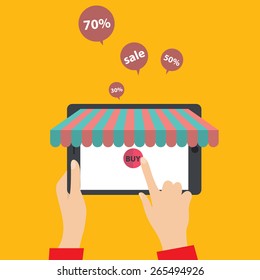 E-shopping concept. Hands touching a tablet