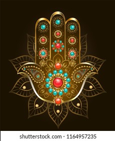 Esoteric, oriental symbol hand Hamsa of gold with turquoise and jasper on black background.
