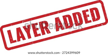 Essential Layer Added grunge textured red rubber stamp indicating a successful update in document or graphic design.