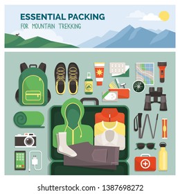 Essential packing for mountain trekking, outdoor travel and sport, clothes and accessories top view