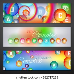 Essential vitamin complex. Creative banners with different vitamins in glossy pills. Beautiful vector illustration in bright colours. Medical, dietary and pharmaceutical image. Landscape template.